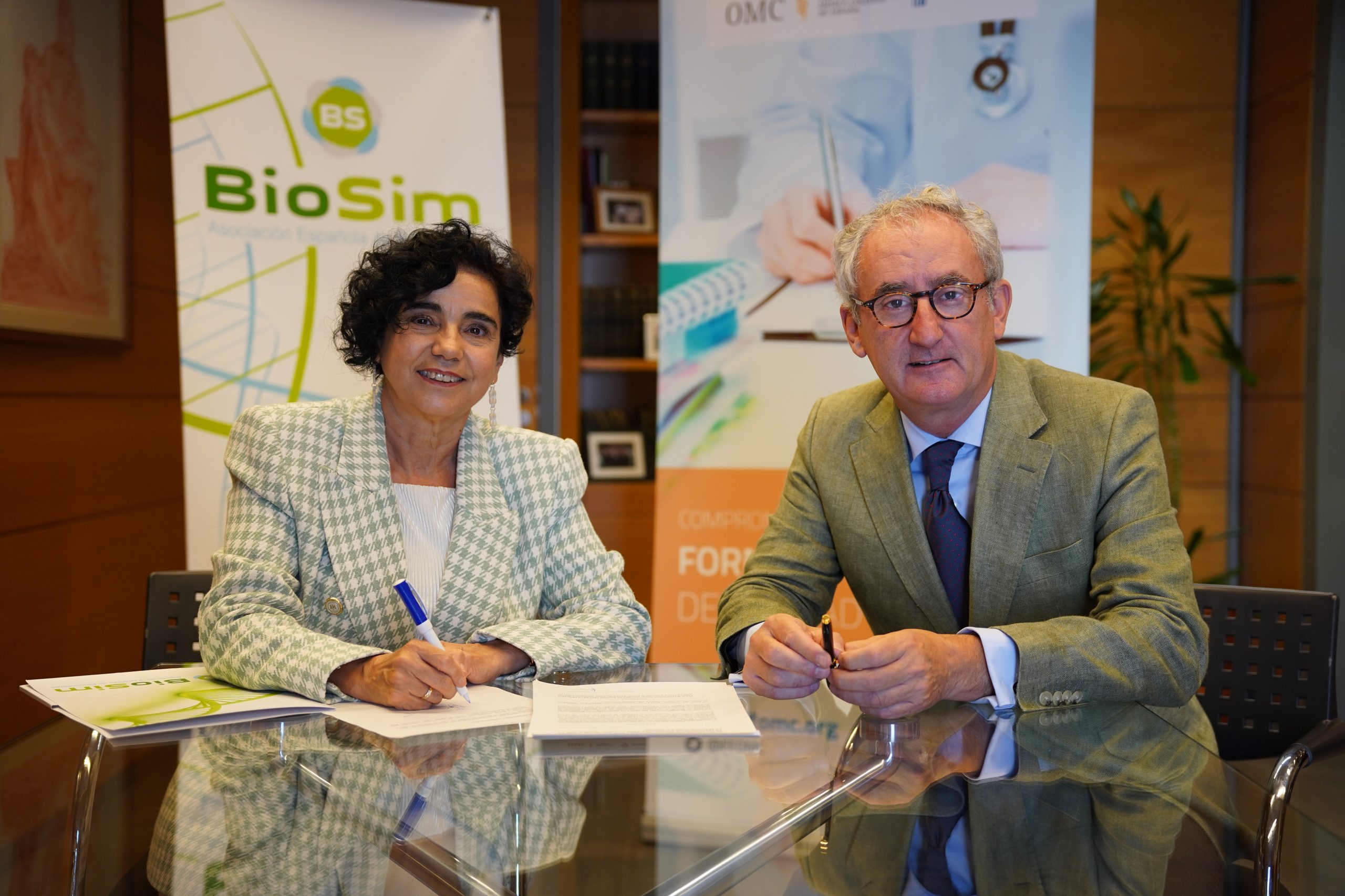 Firma del convenio entre la OMC y Biosim